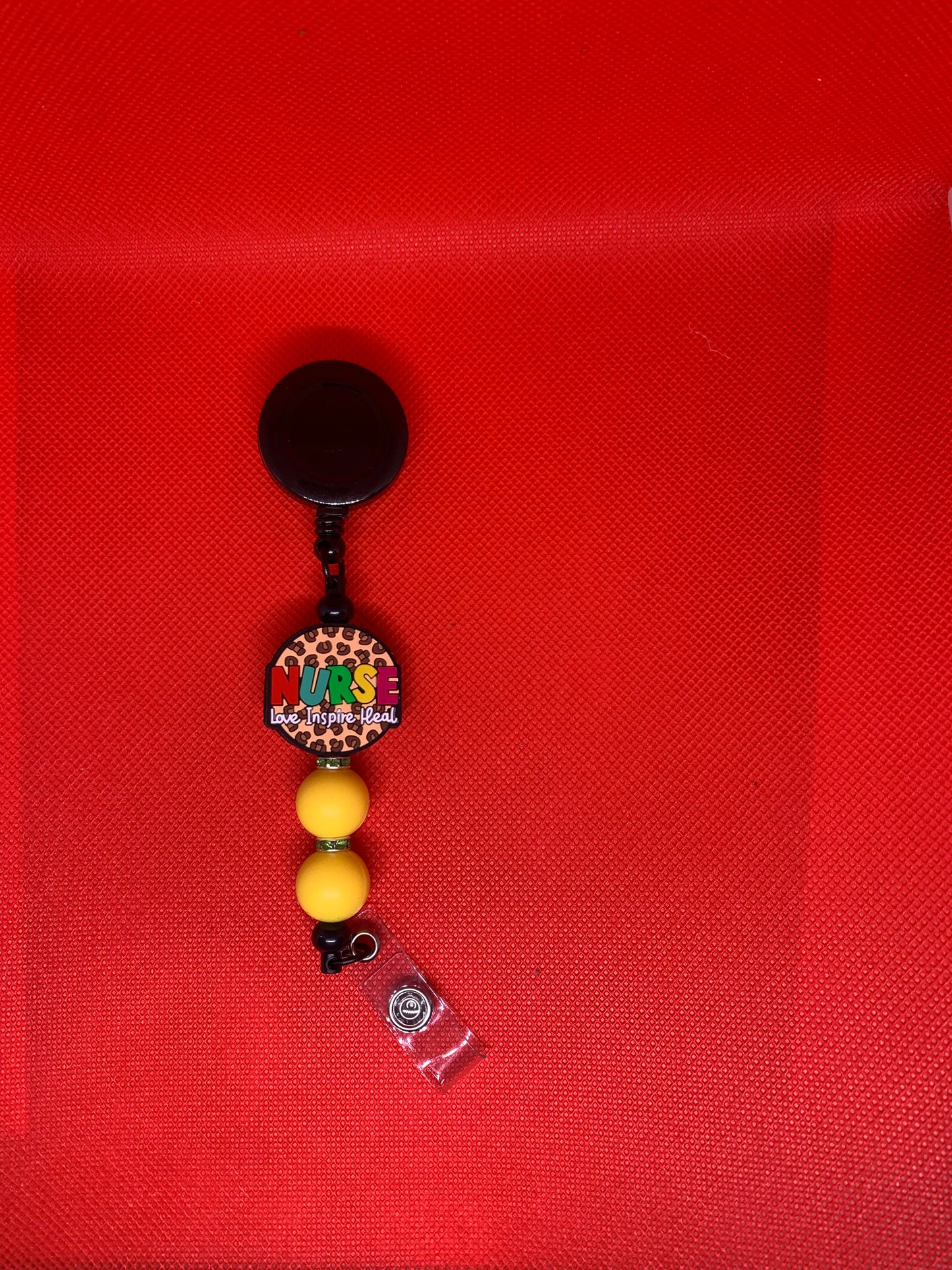 Beaded badge reels